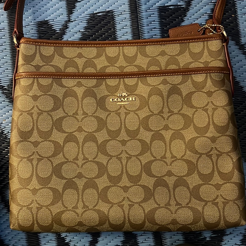 Coach size 9”by 13”